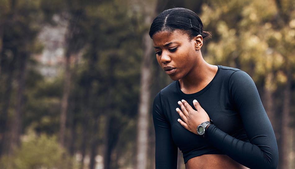 A runner struggling to catch her breath